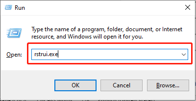 type rstrui.exe and press Enter