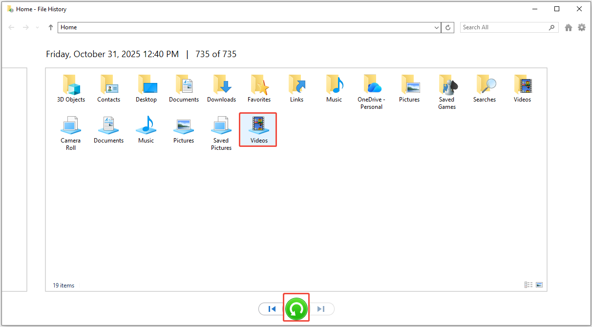 the File History interface to restore videos