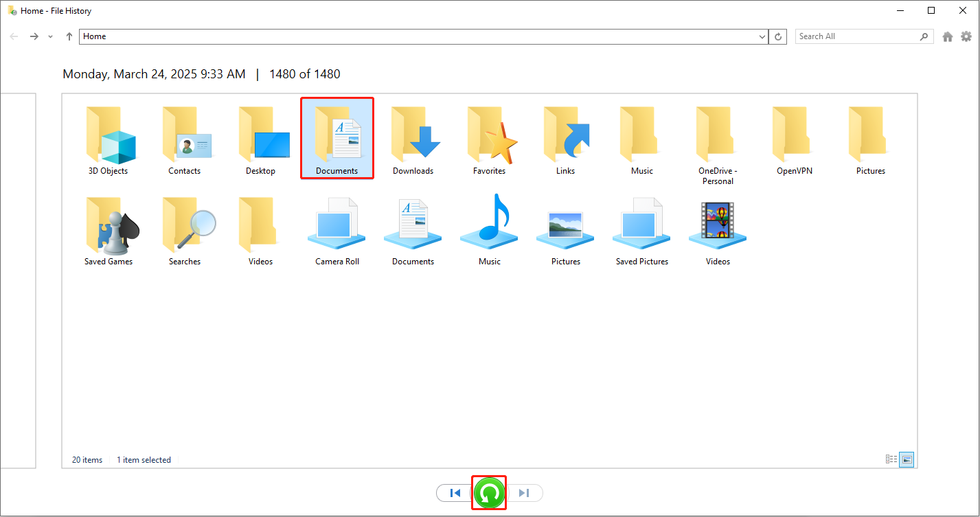 The File History interface showing a list of backup files with the target backup file and the green Restore button selected.