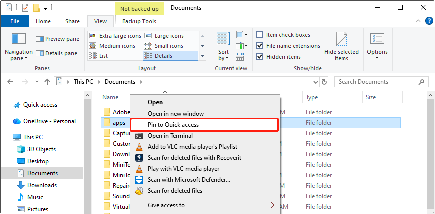 File Explorer interface with the Pin to Quick access option selected to pin the folder to the Quick access tab.