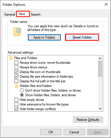 The Folder Options interface with the Reset Folders button selected under View to reset Quick access.