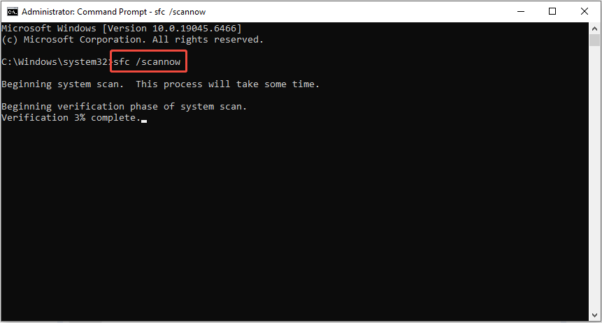 The Command Prompt window showing the SFC command is running with the administrator privilege.