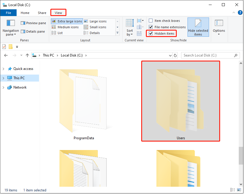 File Explorer interface open to the View tab, with the Hidden items box checked to make the Users folder visible.