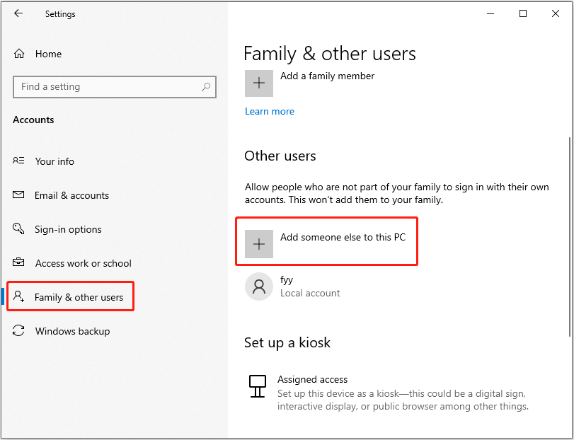 Settings window opened to the Family and other users tab, with the Add someone else to this PC option highlighted.