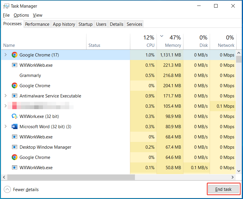 The Task Manager window with selected End task for disabling unnecessary background processes.