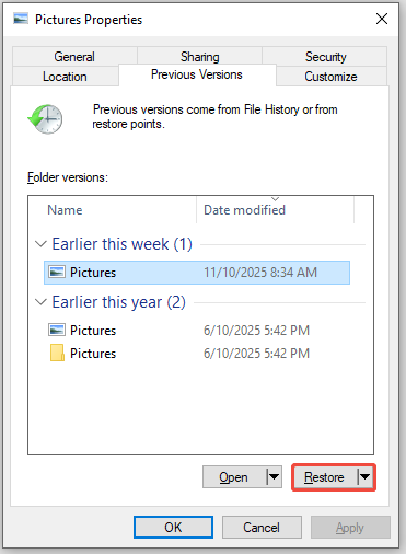 Pictures Properties window showing a list of previous versions, with the Restore button selected in the lower right corner.