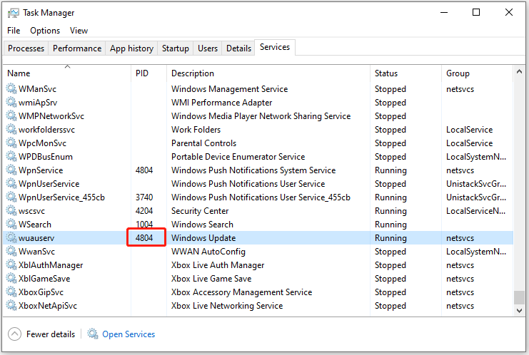 The interface of Task Manager with selected wuauserv service PID number.