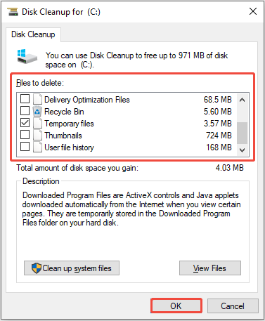 Disk Cleanup interface for freeing up space on the C drive, with files selected for deletion and the OK button highlighted.