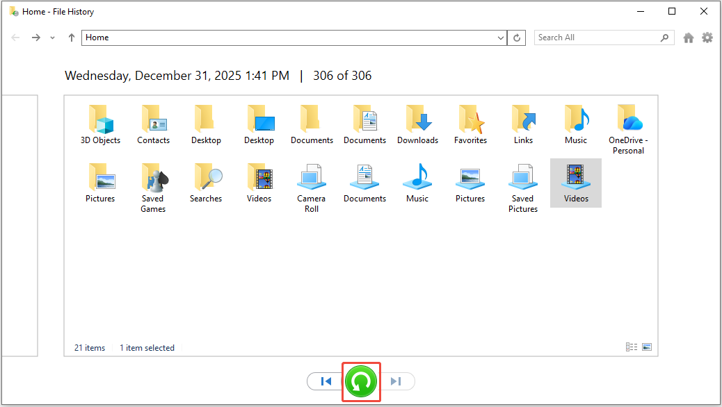 The File History interface showing the backed up files on Windows, with the Restore button highlighted.
