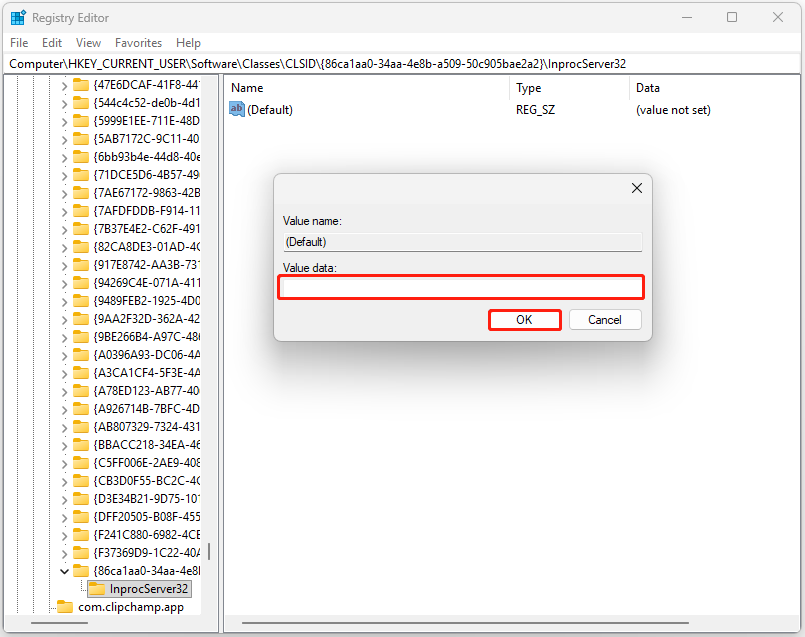 The interface of Registry Editor with selected empty string and OK.