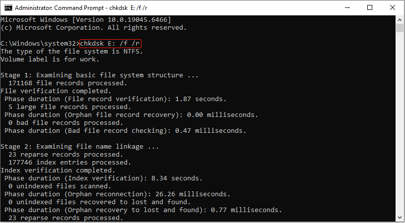 The Command Prompt window running the CHKDSK command to scan the disk and check for bad sectors.