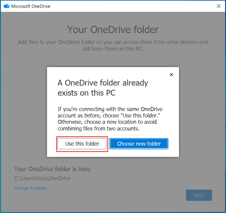 The Microsoft OneDrive window with the selected Use this folder button after relinking the account.