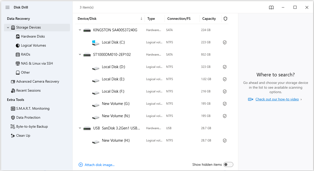 Disk Drill interface showing the built-in tools in the left panel and the detected partitions and devices in the right pane.