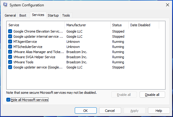 The System Configuration window with Hide all Microsoft services selected to disable all third-party services.