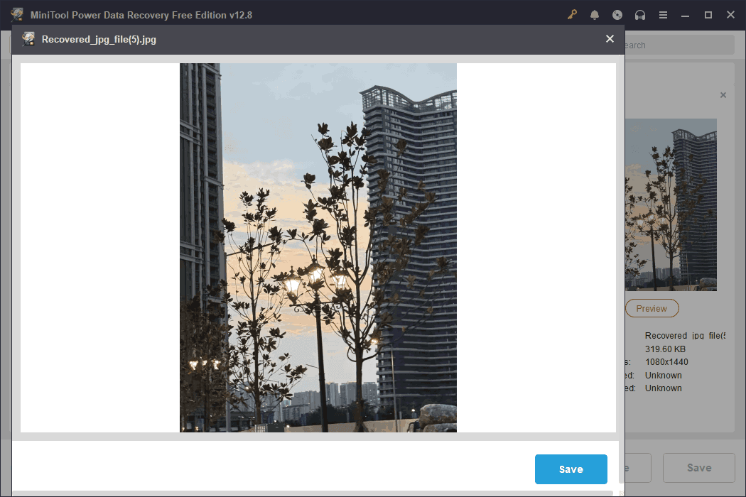 A image showing the sky, trees, and tall buildings embedded in the MiniTool Power Data Recovery interface.