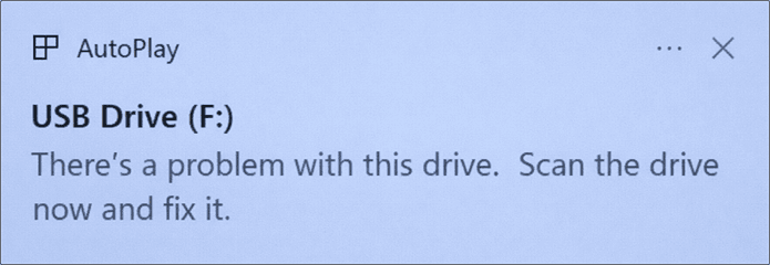 An error message box showing There is a problem with this drive, scan the drive now and fix it.
