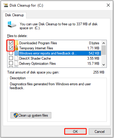 Disk Cleanup interface with the downloaded program files and temporary Internet files selected.