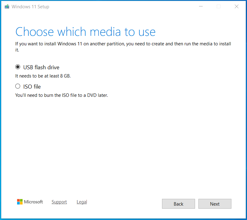 The Media Creation Tool window with selected USB flash drive for bootable media creation.