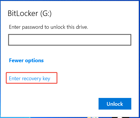 The BitLocker window with the Enter recovery key option selected to unlock a drive.