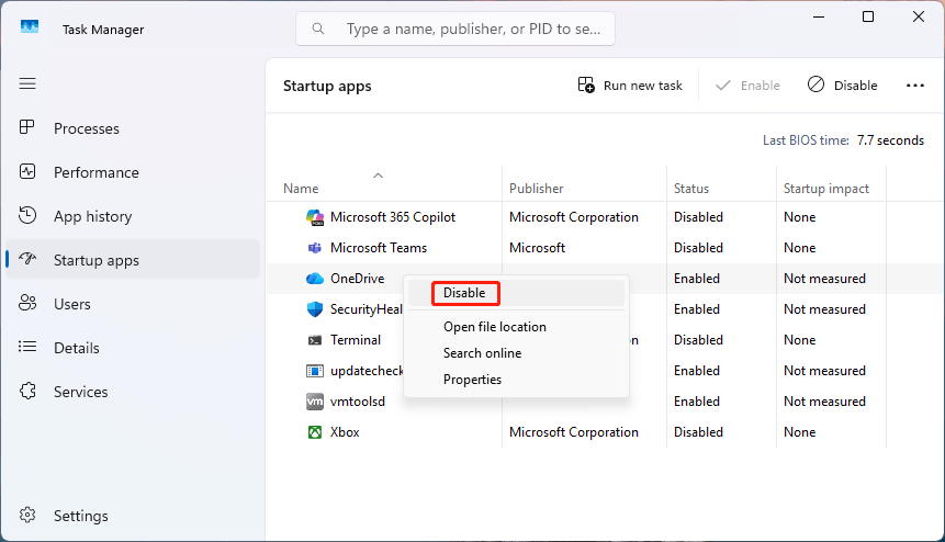 The Windows 11 Task Manager with the Startup apps tab selected and Disable highlighted for OneDrive.