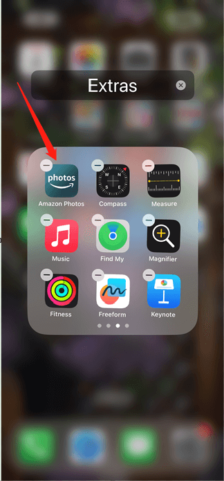 hold Amazon Photos until the remove icon appears