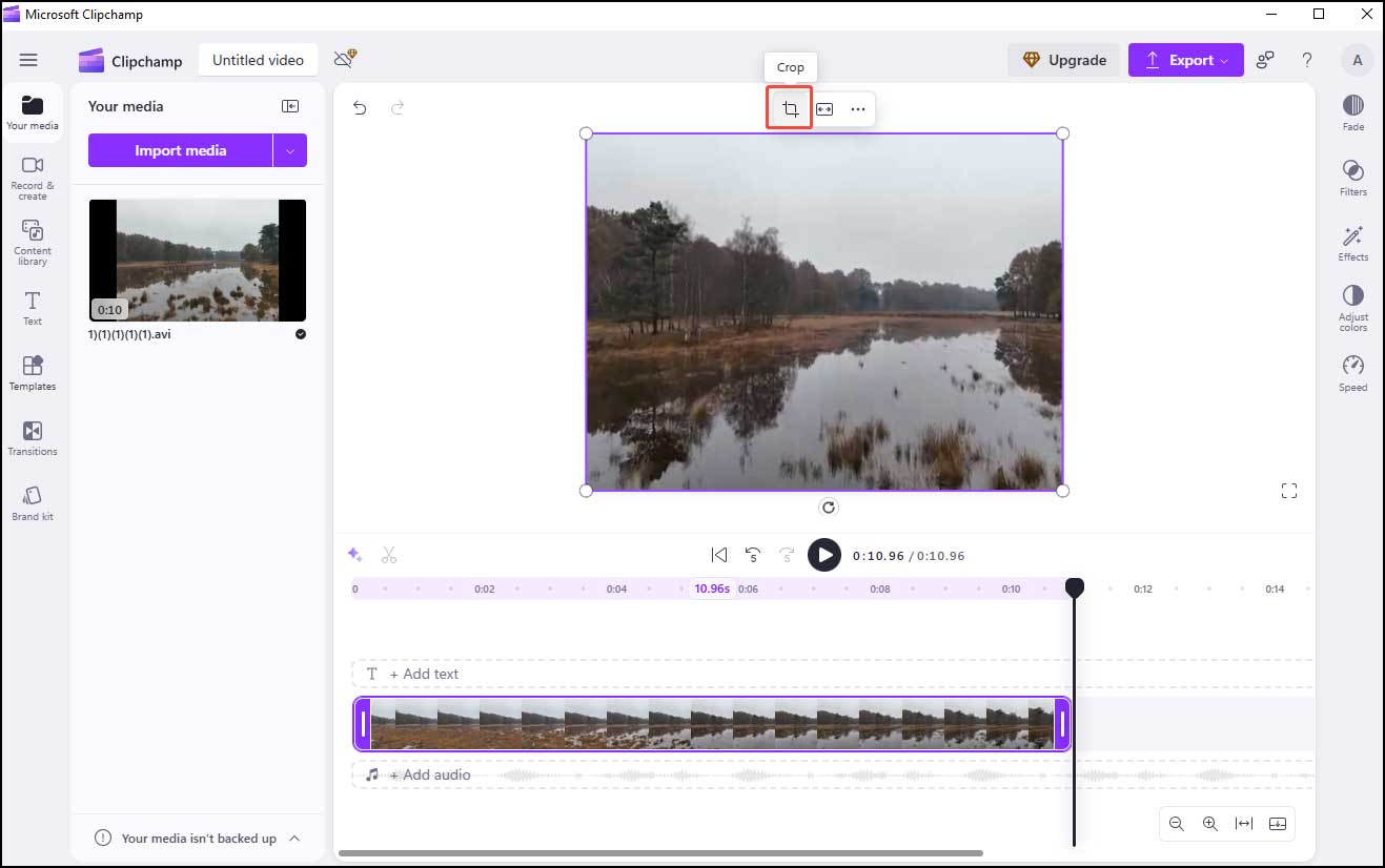 Click the Crop icon in Clipchamp
