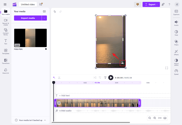 Drag the double-arrow icon inwards to crop the video in Clipchamp