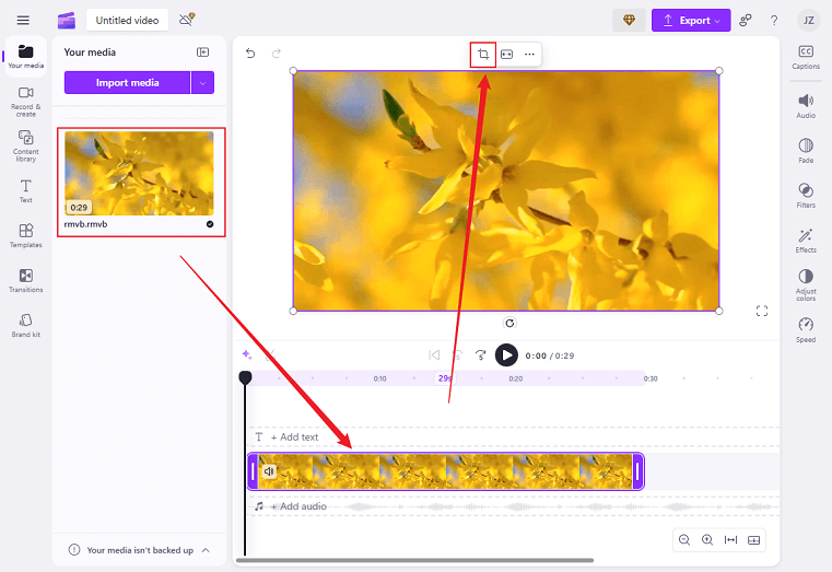 Drag the added video to the timeline and click the Crop icon above the video in Clipchamp