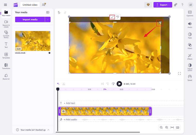 Drag the double-arrow icon inwards to crop the video in Clipchamp