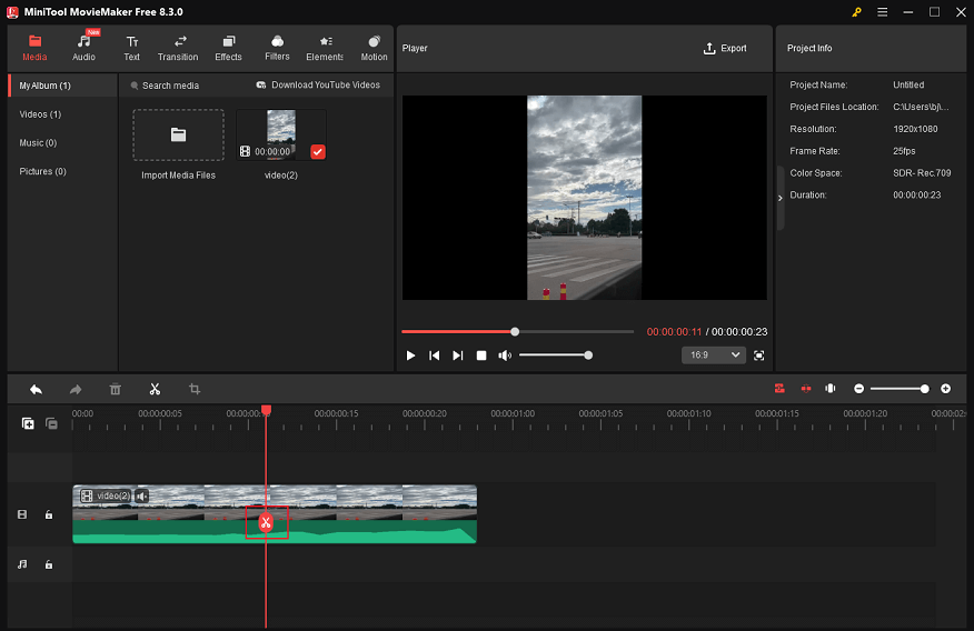 Drag the red playhead to the desired position and click the Scissors icon to split the video in MiniTool MovieMaker
