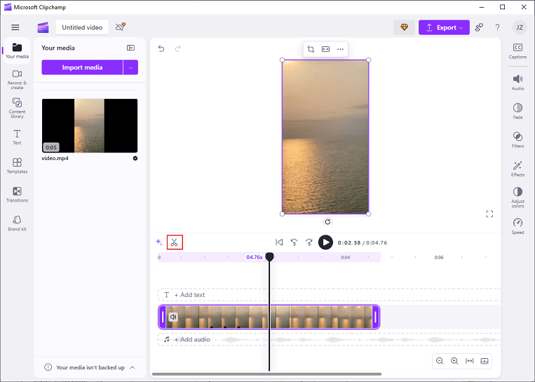Move the playhead to the desired place and click the Scissors icon to cut the video in Clipchamp
