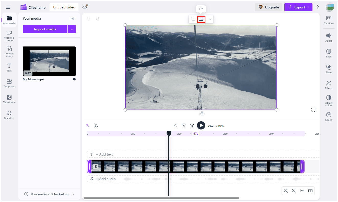 Click the Fit icon to remove black bars in Clipchamp