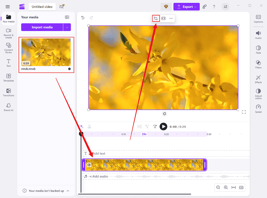 Drag the added video to the timeline and click the Crop icon above the video in Clipchamp
