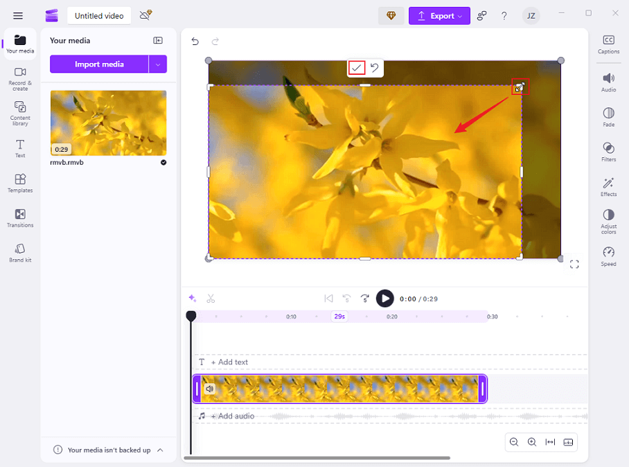 Drag the double-arrow icon inwards to crop the video in Clipchamp