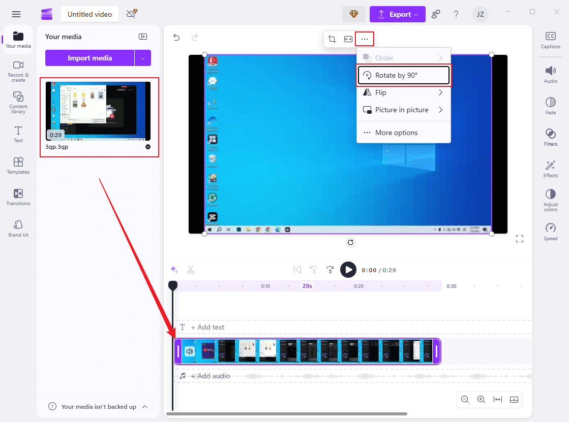 Drag the added video to the timeline, click the three-dot icon at the top, and choose the Rotate by 90° option in Clipchamp