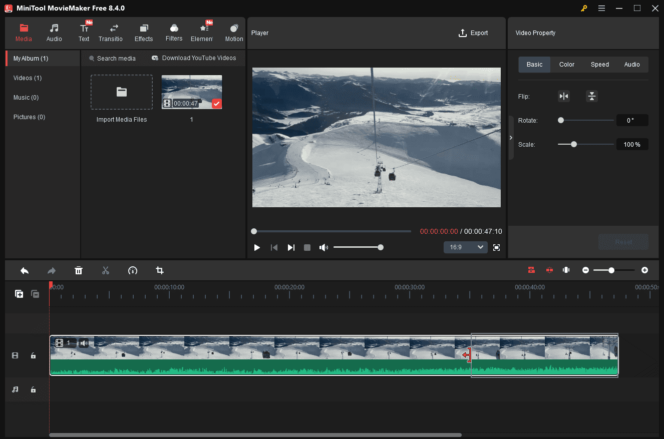 The Trim icon being dragged to the left at the bottom of the MiniTool MovieMaker interface.