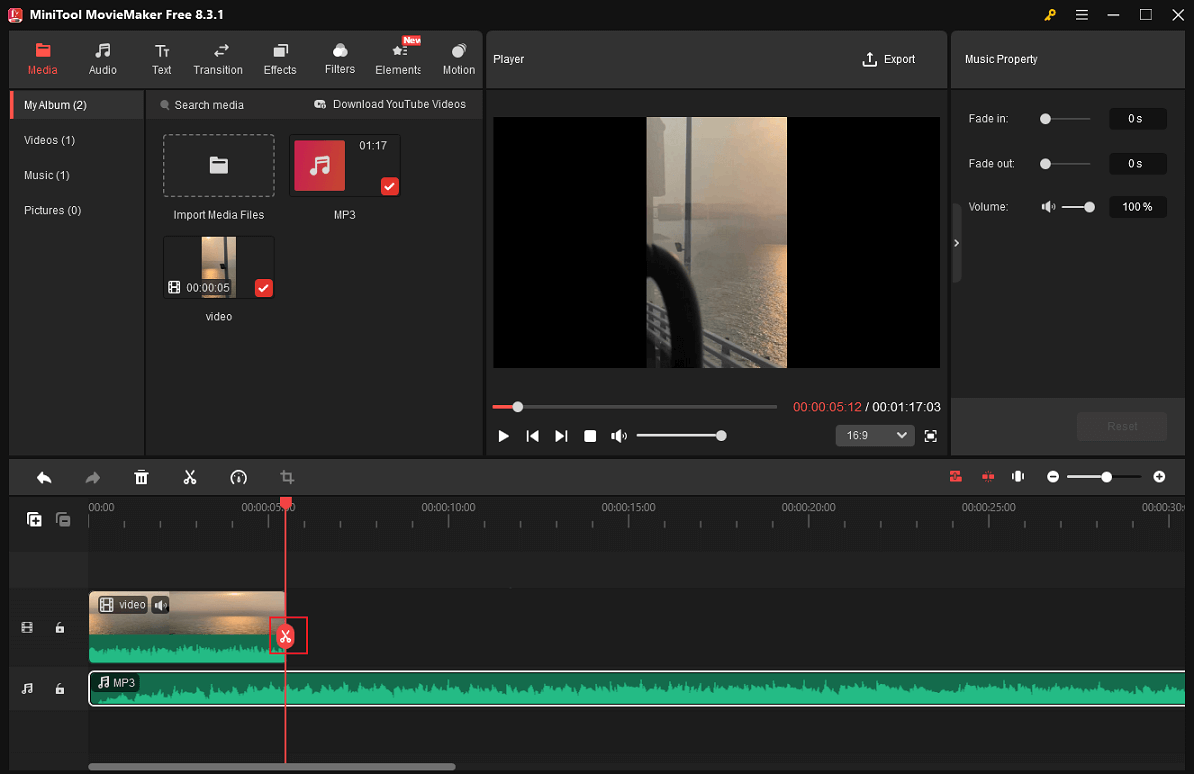 Drag the playhead to the end of the video, click the audio on the track, and click the Scissors icon to split the audio in MiniTool MovieMaker