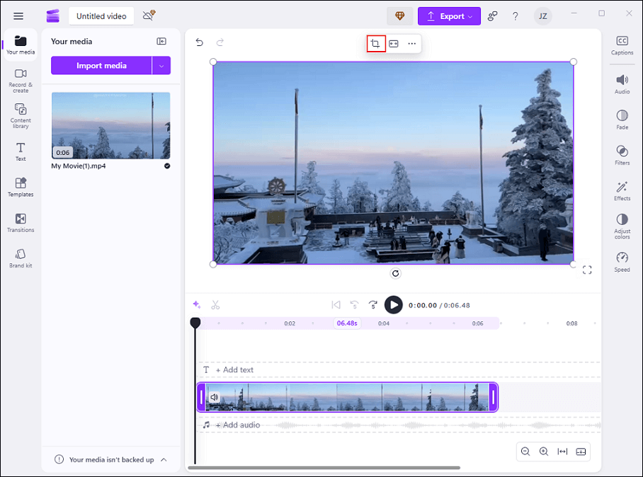 Click the Crop icon above the video preview window in Clipchamp