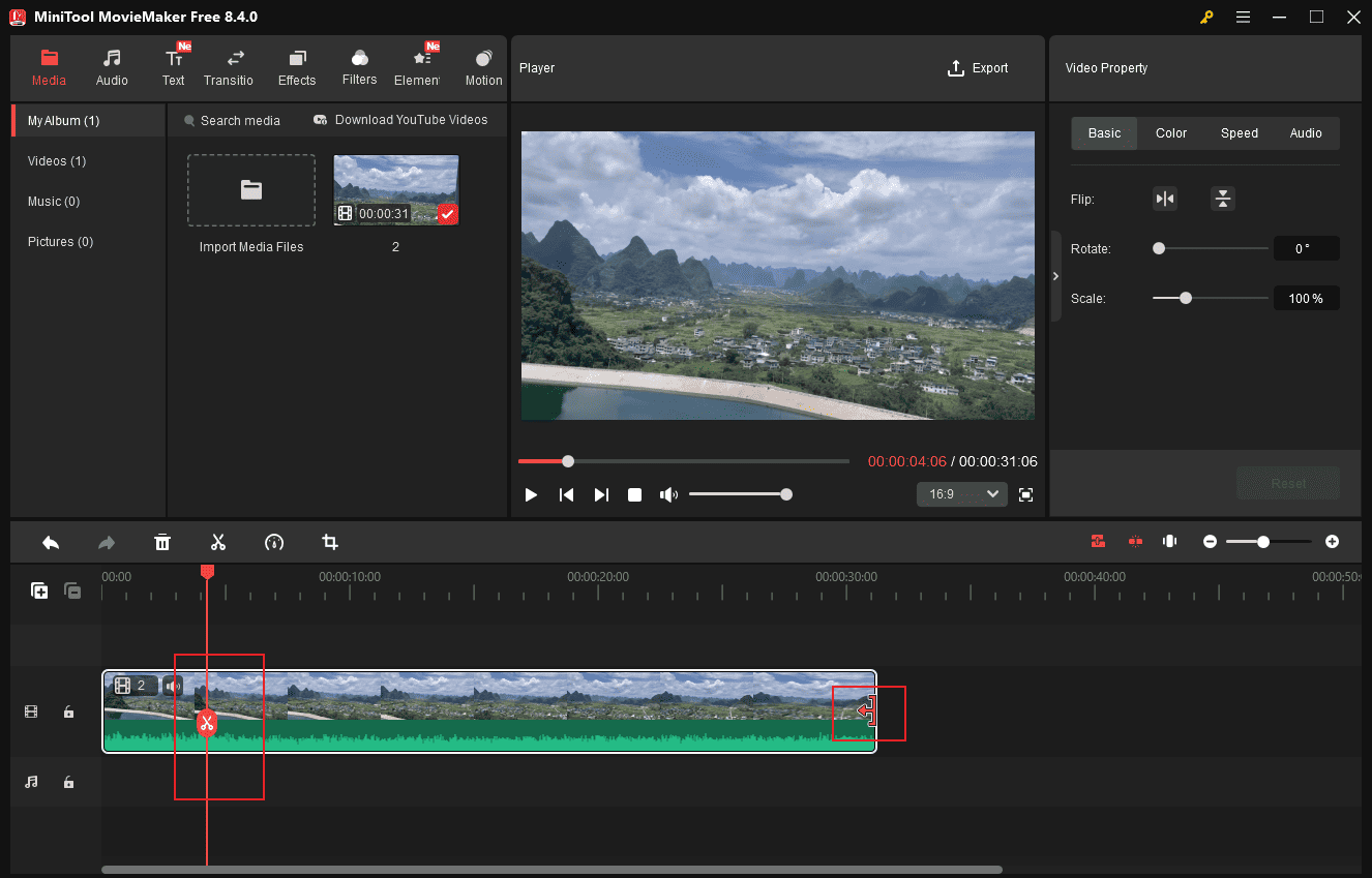 MiniTool MovieMaker interface with the highlighted Trim and Scissors icon.