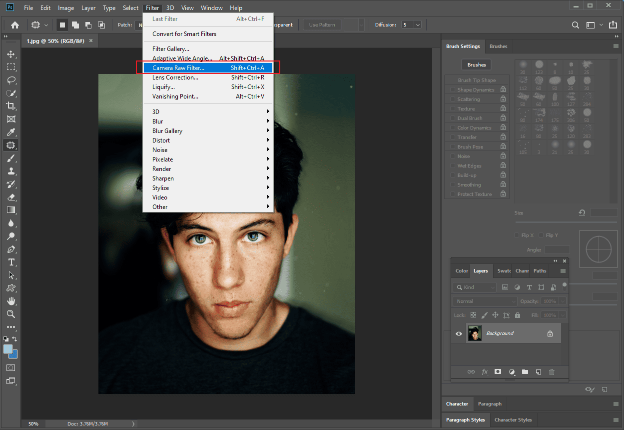 Photoshop interface with the highlighted Camera Raw Filter…option from the Filter tab.