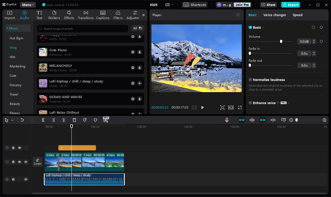 CapCut interface showing four photos, a sticker, and an audio track on the timeline.