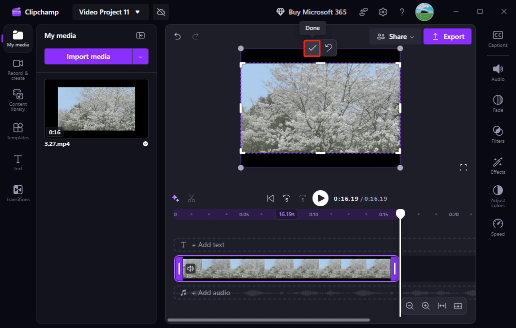 Microsoft Clipchamp interface with the selected Done icon above the preview window.