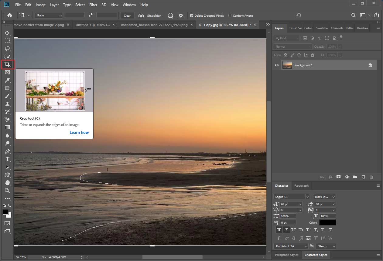 Photoshop interface showing the selected Crop tool icon.