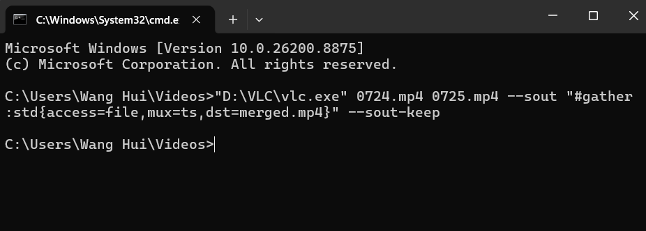 Windows Command Prompt showing a completed command used to merge two MP4 videos via command-line operations.