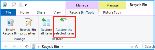 click Restore the selected items in Recycle Bin window