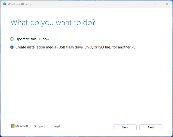 The Windows 10 Setup interface with the options to upgrade this PC now and create an installation for another PC.