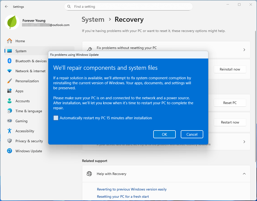 Windows 11 Recovery Settings interface with the Fix problems using Windows Update window.