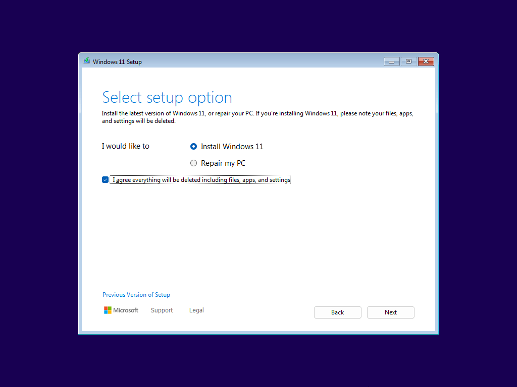 The Windows 11 Setup interface with the selected Install Windows 11 option for a clean install.