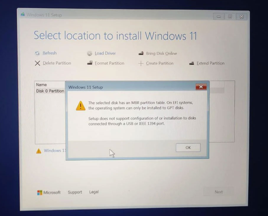The selected disk has an MBR partition table error during Windows 11 Setup.