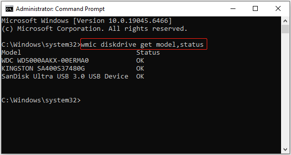 Command Prompt window with the WMIC command entered to check the disk health status.